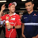 Sebastian Vettel (GER) Ferrari and Pascal Wehrlein (GER) Sauber on the drivers parade at Formula One World Championship, Rd19, Brazilian Grand Prix, Race, Interlagos, Sao Paulo, Brazil, Sunday 12 November 2017. © Kym Illman/Sutton Images