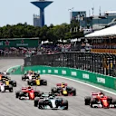 Bottas (FIN) Mercedes-Benz F1 W08 Hybrid and Vettel (GER) Ferrari SF70-H at the start of the race at Formula One World Championship, Rd19, Brazilian Grand Prix, Race, Interlagos, Sao Paulo, Brazil, Sunday 12 November 2017. © Andy Hone/LAT/Sutton Images