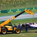 The crashed car of Esteban Ocon (FRA) Force India VJM10 is recovered at Formula One World Championship, Rd19, Brazilian Grand Prix, Race, Interlagos, Sao Paulo, Brazil, Sunday 12 November 2017. © Mark Sutton/Sutton Images