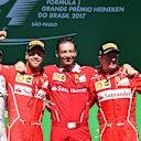 Podium (L to R): Valtteri Bottas (FIN) Mercedes AMG F1, Sebastian Vettel (GER) Ferrari, G Vietina (ITA) Ferrari and Kimi Raikkonen (FIN) Ferrari celebrate on the podium at Formula One World Championship, Rd19, Brazilian Grand Prix, Race, Interlagos, Sao P