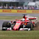 Sebastian Vettel (GER) Ferrari SF70-H with runs wide front delaminating tyre at Formula One World Championship, Rd10, British Grand Prix, Race, Silverstone, England, Sunday 16 July 2017. © Sutton Images