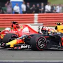 Sebastian Vettel (GER) Ferrari SF70-H and Max Verstappen (NED) Red Bull Racing RB13 battle for position at Formula One World Championship, Rd10, British Grand Prix, Race, Silverstone, England, Sunday 16 July 2017. © Sutton Images