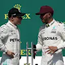 Race winner Lewis Hamilton (GBR) Mercedes AMG F1 celebrates on the podium with Valtteri Bottas (FIN) Mercedes AMG F1 at Formula One World Championship, Rd7, Canadian Grand Prix, Race, Montreal, Canada, Sunday 11 June 2017. © Sutton Images
