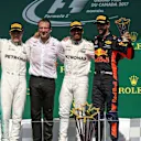 Valtteri Bottas (FIN) Mercedes AMG F1, Loic Serra (SUI) Mercedes AMG F1 Head of Vehicle Dynamics, race winner Lewis Hamilton (GBR) Mercedes AMG F1 and Daniel Ricciardo (AUS) Red Bull Racing celebrate on the podium with the trophies at Formula One World Championship, Rd7, Canadian Grand Prix, Race, Montreal, Canada, Sunday 11 June 2017. © Sutton Motorsport Images
