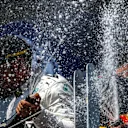 Race winner Lewis Hamilton (GBR) Mercedes AMG F1 celebrates on the podium with the champagne and Daniel Ricciardo (AUS) Red Bull Racing at Formula One World Championship, Rd7, Canadian Grand Prix, Race, Montreal, Canada, Sunday 11 June 2017. © Sutton Motorsport Images