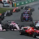 Kimi Raikkonen (FIN) Ferrari SF70-H, Sergio Perez (MEX) Force India VJM10 and Esteban Ocon (FRA) Force India VJM10 at the start of the race at Formula One World Championship, Rd7, Canadian Grand Prix, Race, Montreal, Canada, Sunday 11 June 2017. © Sutton Images