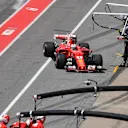 Sebastian Vettel (GER) Ferrari SF70-H pits with a broken front wing at Formula One World Championship, Rd7, Canadian Grand Prix, Race, Montreal, Canada, Sunday 11 June 2017. © Sutton Images