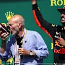Patrick Stewart (GBR) does a Shoey on the podium with Daniel Ricciardo (AUS) Red Bull Racing at Formula One World Championship, Rd7, Canadian Grand Prix, Race, Montreal, Canada, Sunday 11 June 2017. © Sutton Images