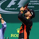 Daniel Ricciardo (AUS) Red Bull Racing does a shoey on the podium watched by Patrick Stewart (GBR) at Formula One World Championship, Rd7, Canadian Grand Prix, Race, Montreal, Canada, Sunday 11 June 2017. © Sutton Motorsport Images