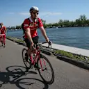Sebastian Vettel (GER) Ferrari SF70-H arrives on a bike at Formula One World Championship, Rd7, Canadian Grand Prix, Race, Montreal, Canada, Sunday 11 June 2017. © Sutton Motorsport Images