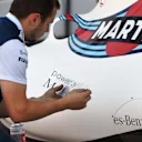 Williams mechanic applies logos to Williams FW40 bodywork at Formula One World Championship, Rd7, Canadian Grand Prix, Preparations, Montreal, Canada, Thursday 8 June 2017. © Sutton Motorsport Images