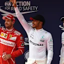 (L to R): Vettel (GER) Ferrari, Hamilton (GBR) and Bottas (FIN) Mercedes AMG F1 celebrate in parc ferme at Formula One World Championship, Rd2, Chinese Grand Prix, Qualifying, Shanghai, China, Saturday 8 April 2017. © Sutton Motorsport Images