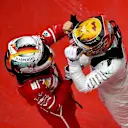 Race winner Lewis Hamilton (GBR) Mercedes AMG F1 and Sebastian Vettel (GER) Ferrari celebrate in parc ferme at Formula One World Championship, Rd2, Chinese Grand Prix, Race, Shanghai, China, Sunday 9 April 2017. © Sutton Motorsport Images