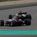 Jolyon Palmer (GBR) Renault Sport F1 Team RS17 and Romain Grosjean (FRA) Haas VF-17 battle for position at Formula One World Championship, Rd2, Chinese Grand Prix, Race, Shanghai, China, Sunday 9 April 2017. © Sutton Motorsport Images