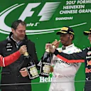 Sebastian Vettel (GER) Ferrari, Aldo Costa (ITA) Mercedes AMG, Lewis Hamilton (GBR) Mercedes AMG and Max Verstappen (NED) Red Bull celebrate on the podium at F1 World Championship, Chinese Grand Prix, Shanghai, 9 April 2017. ©Sutton Motorsport Images
