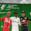 (L to R): Vettel Ferrari, Hamilton Mercedes AMG F1 and Verstappen Red Bull Racing celebrate on the podium with the trophies at Formula One World Championship, Rd2, Chinese Grand Prix, Race, Shanghai, China, Sunday 9 April 2017. © Sutton Motorsport Images