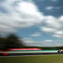 Jolyon Palmer (GBR) Renault Sport F1 Team RS17 with puncture and damage in FP1 and Stoffel Vandoorne (BEL) McLaren MCL32 at Formula One World Championship, Rd11, Hungarian Grand Prix, Practice, Hungaroring, Hungary, Friday 28 July 2017. © Sutton Images