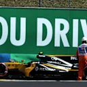 Marshal and the crashed car of Jolyon Palmer (GBR) Renault Sport F1 Team RS17 in FP2 at Formula One World Championship, Rd11, Hungarian Grand Prix, Practice, Hungaroring, Hungary, Friday 28 July 2017. © Sutton Images