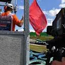 Marshal waves the red flag at Formula One World Championship, Rd11, Hungarian Grand Prix, Practice, Hungaroring, Hungary, Friday 28 July 2017. © Sutton Images