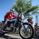 Sebastian Vettel (GER) Ferrari arrives on his Suzuki 750 motorbike at Formula One World Championship, Rd11, Hungarian Grand Prix, Qualifying, Hungaroring, Hungary, Saturday 29 July 2017. © Sutton Images