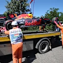 The car of Daniel Ricciardo (AUS) Red Bull Racing RB13 is recovered my Marshals after stopping on track in FP3 at Formula One World Championship, Rd11, Hungarian Grand Prix, Qualifying, Hungaroring, Hungary, Saturday 29 July 2017. © Sutton Images