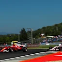 Sebastian Vettel (GER) Ferrari SF70-H and Sergio Perez (MEX) Force India VJM10 at Formula One World Championship, Rd11, Hungarian Grand Prix, Qualifying, Hungaroring, Hungary, Saturday 29 July 2017. © Sutton Images