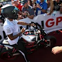 Lewis Hamilton (GBR) Mercedes AMG F1 on his MV Agusta Dragster RR LH44 Limited Edition motorbike with the fans at Formula One World Championship, Rd11, Hungarian Grand Prix, Qualifying, Hungaroring, Hungary, Saturday 29 July 2017. © Sutton Images