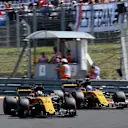 Nico Hulkenberg (GER) Renault Sport F1 Team RS17 passes Jolyon Palmer (GBR) Renault Sport F1 Team RS17 at Formula One World Championship, Rd11, Hungarian Grand Prix, Race, Hungaroring, Hungary, Sunday 30 July 2017. © Sutton Images