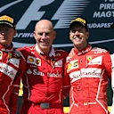 Race winner Sebastian Vettel (GER) Ferrari celebrates on the podium with Kimi Raikkonen (FIN) Ferrari, Jock Clear (GBR) Ferrari Chief Engineer and Valtteri Bottas (FIN) Mercedes AMG F1 at Formula One World Championship, Rd11, Hungarian Grand Prix, Race, Hungaroring, Hungary, Sunday 30 July 2017. © Sutton Images