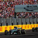 Valtteri Bottas (FIN) Mercedes-Benz F1 W08 Hybrid and Lewis Hamilton (GBR) Mercedes-Benz F1 W08 Hybrid cross the line to take the chequered flag and third and fourth positions respectively at Formula One World Championship, Rd11, Hungarian Grand Prix, Race, Hungaroring, Hungary, Sunday 30 July 2017. © Sutton Images