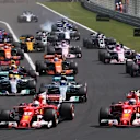 Sebastian Vettel (GER) Ferrari SF70-H leads at the start of the race at Formula One World Championship, Rd11, Hungarian Grand Prix, Race, Hungaroring, Hungary, Sunday 30 July 2017. © Sutton Images