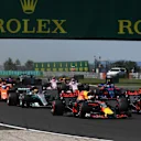 Daniel Ricciardo (AUS) Red Bull Racing RB13 and Max Verstappen (NED) Red Bull Racing RB13 at the start of the race at Formula One World Championship, Rd11, Hungarian Grand Prix, Race, Hungaroring, Hungary, Sunday 30 July 2017. © Sutton Images