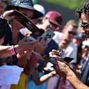 Daniel Ricciardo (AUS) Red Bull Racing signs autographs for the fans at Formula One World Championship, Rd11, Hungarian Grand Prix, Race, Hungaroring, Hungary, Sunday 30 July 2017. © Sutton Images