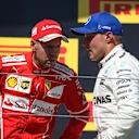 Sebastian Vettel (GER) Ferrari and Valtteri Bottas (FIN) Mercedes AMG F1 on the podium at Formula One World Championship, Rd11, Hungarian Grand Prix, Race, Hungaroring, Hungary, Sunday 30 July 2017. © Sutton Images