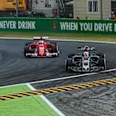 Kevin Magnussen (DEN) Haas VF-17 locks up and runs wide alongside Sebastian Vettel (GER) Ferrari SF70-H at Formula One World Championship, Rd13, Italian Grand Prix, Practice, Monza, Italy, Friday 1 September 2017. © Sutton Images