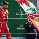 Sebastian Vettel (GER) Ferrari celebrates on the podium at Formula One World Championship, Rd13, Italian Grand Prix, Race, Monza, Italy, Sunday 3 September 2017. © Sutton Images