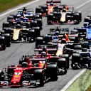 Raikkonen (FIN) Ferrari SF70-H and Vettel (GER) Ferrari SF70-H as Massa (BRA) Williams FW40 runs wide at the start of the race at Formula One World Championship, Rd13, Italian Grand Prix, Race, Monza, Italy, Sunday 3 September 2017. © Sutton Images