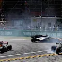 Fernando Alonso (ESP) McLaren MCL32, Romain Grosjean (FRA) Haas VF-17 and Jolyon Palmer (GBR) Renault Sport F1 Team RS17 battle at Formula One World Championship, Rd13, Italian Grand Prix, Race, Monza, Italy, Sunday 3 September 2017. © Sutton Images