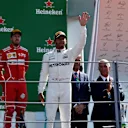 Race winner Lewis Hamilton (GBR) Mercedes AMG F1 and Sebastian Vettel (GER) Ferrari celebrate on the podium at Formula One World Championship, Rd13, Italian Grand Prix, Race, Monza, Italy, Sunday 3 September 2017. © Sutton Images