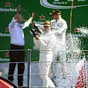 Lewis Hamilton (GBR) Mercedes AMG F1 and Valtteri Bottas (FIN) Mercedes AMG F1 celebrate on the podium with the champagne at Formula One World Championship, Rd13, Italian Grand Prix, Race, Monza, Italy, Sunday 3 September 2017. © Sutton Images