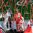 Bottas (FIN) Mercedes AMG F1, Hamilton (GBR) Mercedes AMG F1 and Vettel (GER) Ferrari celebrate on the podium with the champagne at Formula One World Championship, Rd13, Italian Grand Prix, Race, Monza, Italy, Sunday 3 September 2017. © Sutton Images