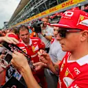 Kimi Raikkonen (FIN) Ferrari signs autographs for the fans at Formula One World Championship, Rd13, Italian Grand Prix, Preparations, Monza, Italy, Thursday 31 August 2017. © Sutton Images