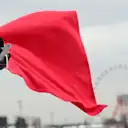 Marshal waves the red flag at Formula One World Championship, Rd16, Japanese Grand Prix, Practice, Suzuka, Japan, Friday 6 October 2017. © Kym Illman/Sutton Images