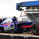 The crashed car of Carlos Sainz (ESP) Scuderia Toro Rosso STR12 is recovered after FP1 at Formula One World Championship, Rd16, Japanese Grand Prix, Practice, Suzuka, Japan, Friday 6 October 2017. © Rubio/Sutton Images