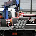 The crashed car of Kimi Raikkonen (FIN) Ferrari SF70-H is recovered in FP3 at Formula One World Championship, Rd16, Japanese Grand Prix, Qualifying, Suzuka, Japan, Saturday 7 October 2017. © Mark Sutton/Sutton Images