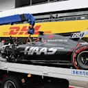 The crashed car of Romain Grosjean (FRA) Haas VF-17 is recovered in Q1 at Formula One World Championship, Rd16, Japanese Grand Prix, Qualifying, Suzuka, Japan, Saturday 7 October 2017. © Mark Sutton/Sutton Images