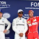 (L to R): Valtteri Bottas (FIN) Mercedes AMG F1, pole sitter Lewis Hamilton (GBR) Mercedes AMG F1 and Sebastian Vettel (GER) Ferrari celebrate in parc ferme at Formula One World Championship, Rd16, Japanese Grand Prix, Qualifying, Suzuka, Japan, Saturday 7 October 2017. © Mark Sutton/Sutton Images