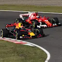 Max Verstappen (NED) Red Bull Racing RB13 and Kimi Raikkonen (FIN) Ferrari SF70-H battle for position at Formula One World Championship, Rd16, Japanese Grand Prix, Race, Suzuka, Japan, Sunday 8 October 2017. © Manuel Goria/Sutton Images
