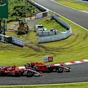 Sebastian Vettel (GER) Ferrari SF70-H and Max Verstappen (NED) Red Bull Racing RB13 battle for position at Formula One World Championship, Rd16, Japanese Grand Prix, Race, Suzuka, Japan, Sunday 8 October 2017. © Kym Illman/Sutton Images