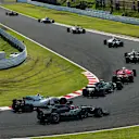 Romain Grosjean (FRA) Haas VF-17 and Lance Stroll (CDN) Williams FW40 battle for position at the start of the race at Formula One World Championship, Rd16, Japanese Grand Prix, Race, Suzuka, Japan, Sunday 8 October 2017. © Kym Illman/Sutton Images
